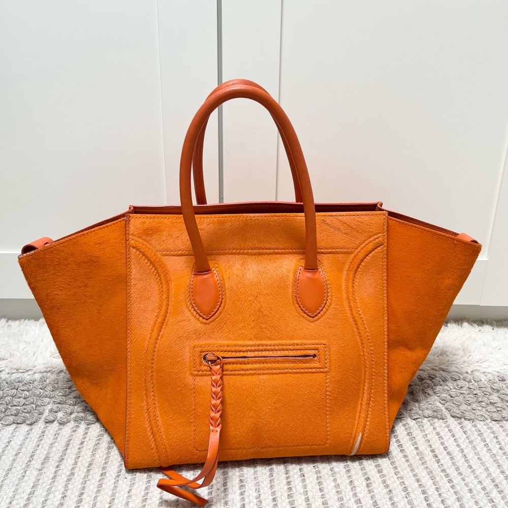 Orange handbag with pony hair